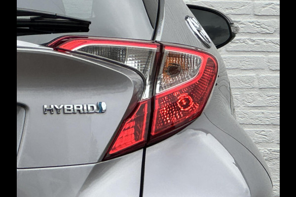 Toyota C-HR 1.8 Hybrid Style Cruise control Climate control Stoelverwarming JBL Parkeersensoren voor/achter Achteruitrijcamera
