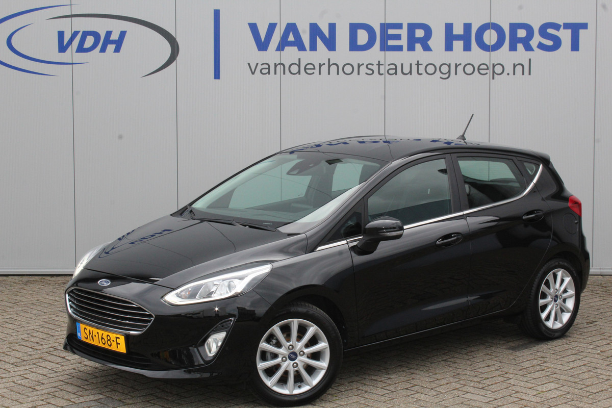Ford Fiesta 1.0-100pk EcoBoost Titanium. Mooie en zuinige Ford Fiesta in de luxe Titanium uitvoering.
