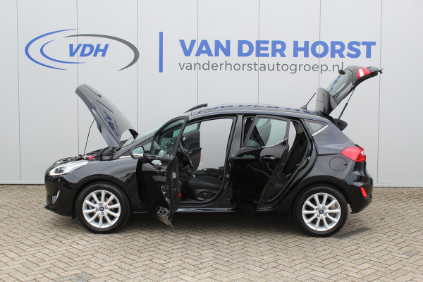 Ford Fiesta 1.0-100pk EcoBoost Titanium. Mooie en zuinige Ford Fiesta in de luxe Titanium uitvoering.