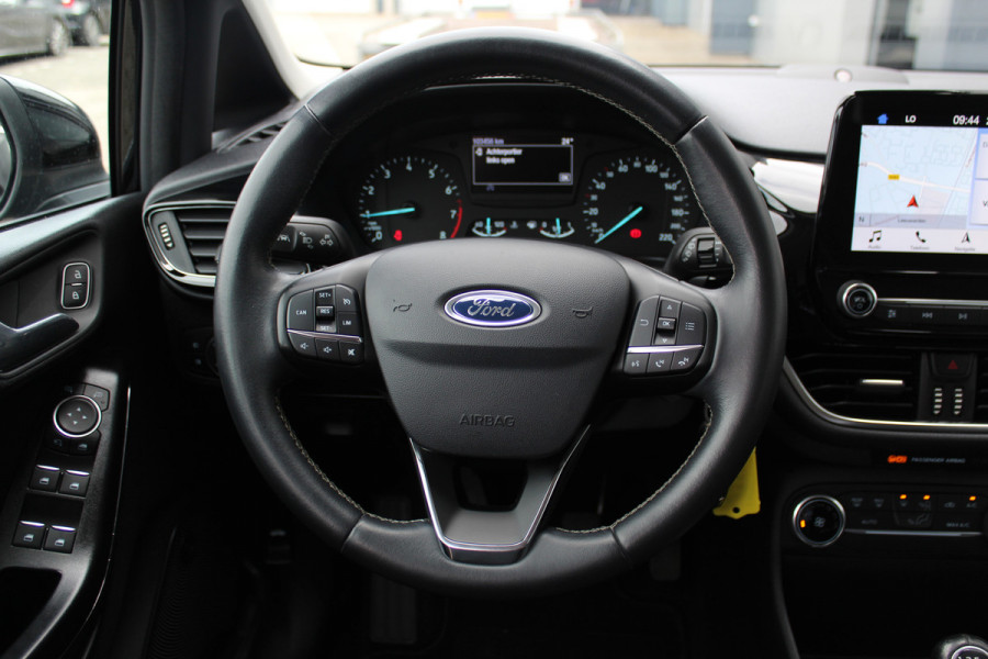 Ford Fiesta 1.0-100pk EcoBoost Titanium. Mooie en zuinige Ford Fiesta in de luxe Titanium uitvoering.
