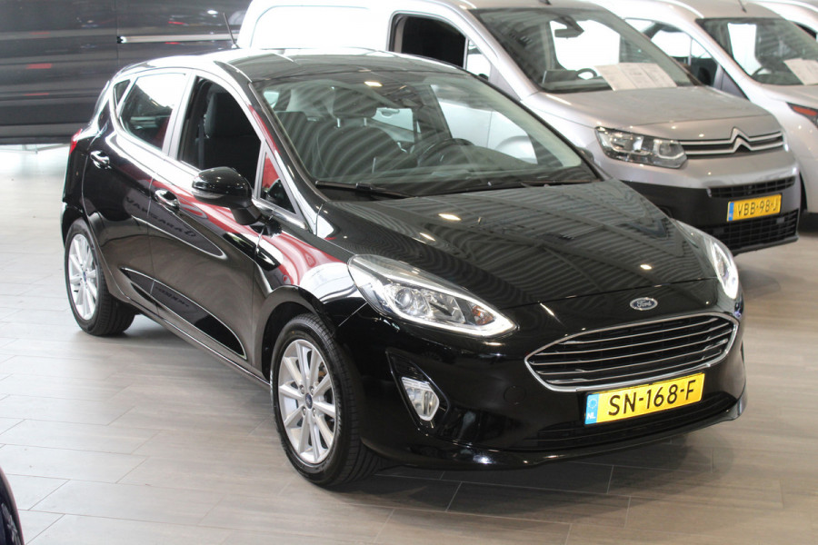 Ford Fiesta 1.0-100pk EcoBoost Titanium. Mooie en zuinige Ford Fiesta in de luxe Titanium uitvoering.