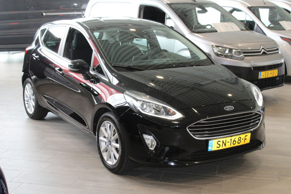 Ford Fiesta 1.0-100pk EcoBoost Titanium. Mooie en zuinige Ford Fiesta in de luxe Titanium uitvoering.