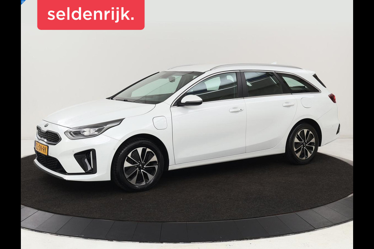 Kia Ceed 1.6 GDI PHEV DynamicPlusLine | Stoel & stuurverwarming | Adaptive cruise | Memory | Camera | Carplay | Full LED | Achterbankverwarming | Navigatie | Keyless Kia Ceed 1.6 GDI PHEV DynamicPlusLine | Stoel & stuurverwarming | Adaptive cruise | Memory | Camera | Carplay | Full LED | Achterbankverwarming | Navigatie | Keyless
