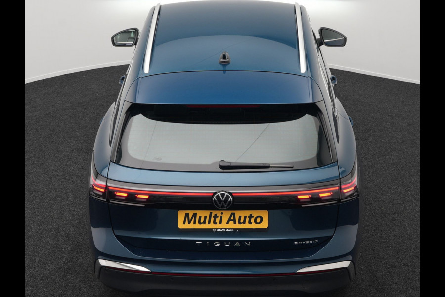 Volkswagen Tiguan 1.5 eHybrid Elegance Plug In Hybrid 204pk Dealer O.H PHEV | Trekhaak Af Fabriek | Adaptive Cruise | 360 Camera | IQ Light | Lederen Sportstoelen Massage & Memory | Virtual | Keyless | Lane Assist | Verwarmde Stuur & Stoel | Apple Carplay |