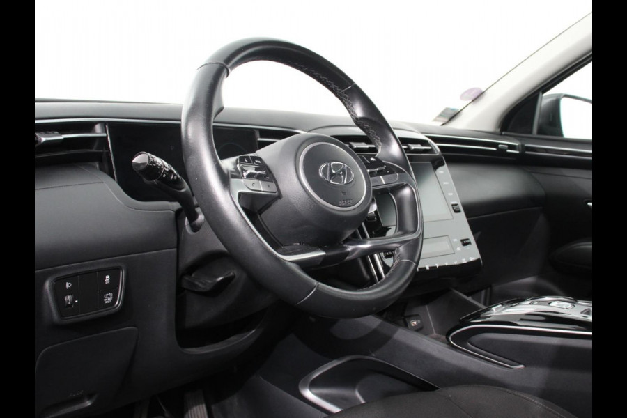Hyundai Tucson 1.6 T-GDI HEV Comfort Climate control Adaptieve cruise control Parkeersensoren Achteruitrijcamera Navigatie Voorstoelen verwarmd Apple Carplay/ Android Auto