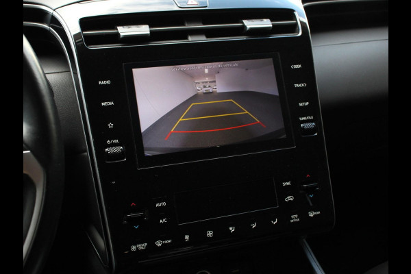 Hyundai Tucson 1.6 T-GDI HEV Comfort Climate control Adaptieve cruise control Parkeersensoren Achteruitrijcamera Navigatie Voorstoelen verwarmd Apple Carplay/ Android Auto