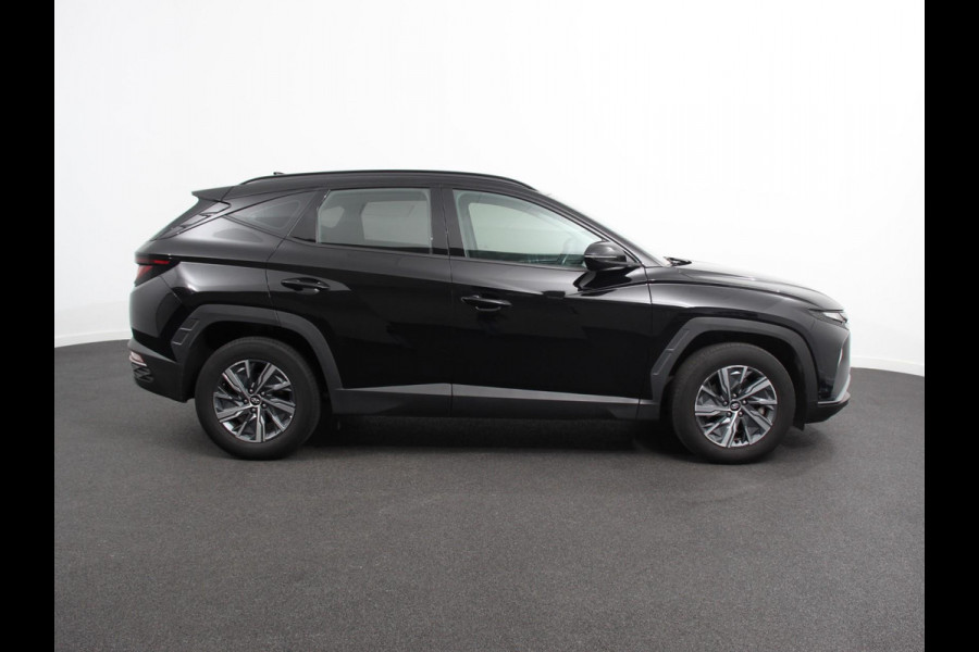 Hyundai Tucson 1.6 T-GDI HEV Comfort Climate control Adaptieve cruise control Parkeersensoren Achteruitrijcamera Navigatie Voorstoelen verwarmd Apple Carplay/ Android Auto