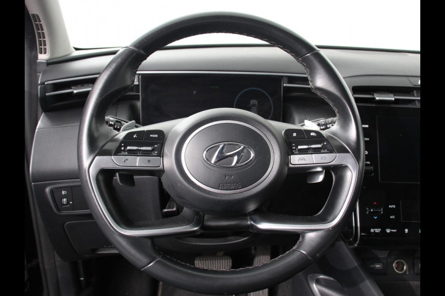 Hyundai Tucson 1.6 T-GDI HEV Comfort Climate control Adaptieve cruise control Parkeersensoren Achteruitrijcamera Navigatie Voorstoelen verwarmd Apple Carplay/ Android Auto