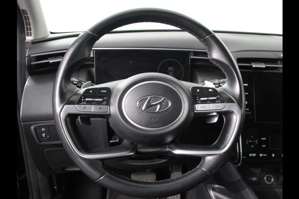 Hyundai Tucson 1.6 T-GDI HEV Comfort Climate control Adaptieve cruise control Parkeersensoren Achteruitrijcamera Navigatie Voorstoelen verwarmd Apple Carplay/ Android Auto