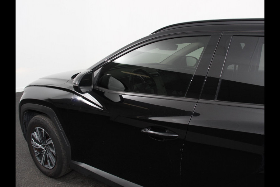 Hyundai Tucson 1.6 T-GDI HEV Comfort Climate control Adaptieve cruise control Parkeersensoren Achteruitrijcamera Navigatie Voorstoelen verwarmd Apple Carplay/ Android Auto