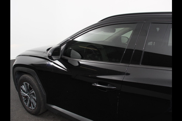Hyundai Tucson 1.6 T-GDI HEV Comfort Climate control Adaptieve cruise control Parkeersensoren Achteruitrijcamera Navigatie Voorstoelen verwarmd Apple Carplay/ Android Auto