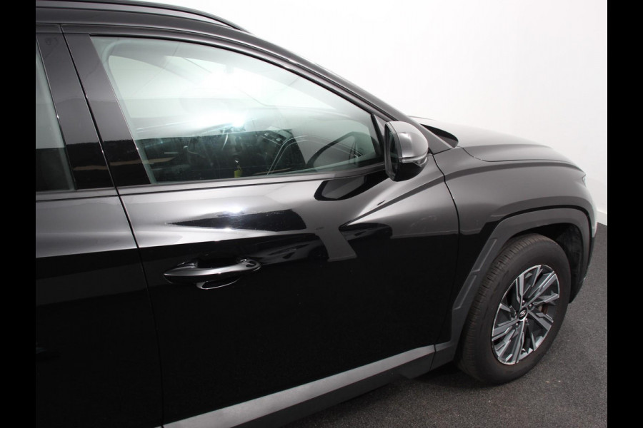 Hyundai Tucson 1.6 T-GDI HEV Comfort Climate control Adaptieve cruise control Parkeersensoren Achteruitrijcamera Navigatie Voorstoelen verwarmd Apple Carplay/ Android Auto