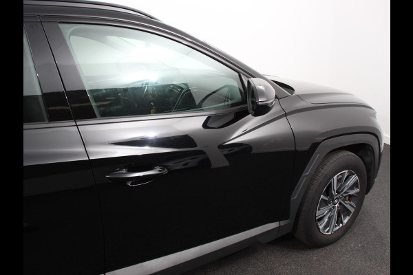 Hyundai Tucson 1.6 T-GDI HEV Comfort Climate control Adaptieve cruise control Parkeersensoren Achteruitrijcamera Navigatie Voorstoelen verwarmd Apple Carplay/ Android Auto