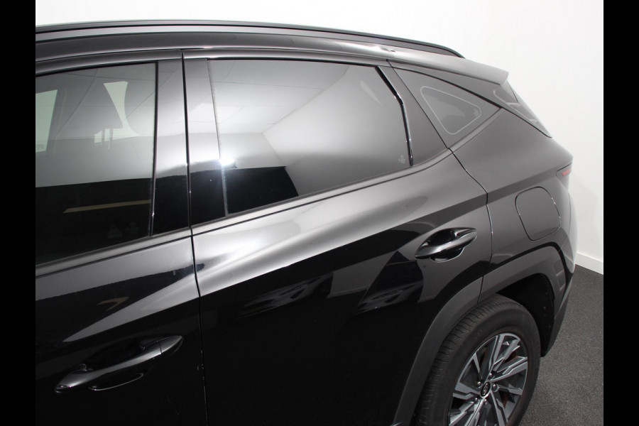 Hyundai Tucson 1.6 T-GDI HEV Comfort Climate control Adaptieve cruise control Parkeersensoren Achteruitrijcamera Navigatie Voorstoelen verwarmd Apple Carplay/ Android Auto