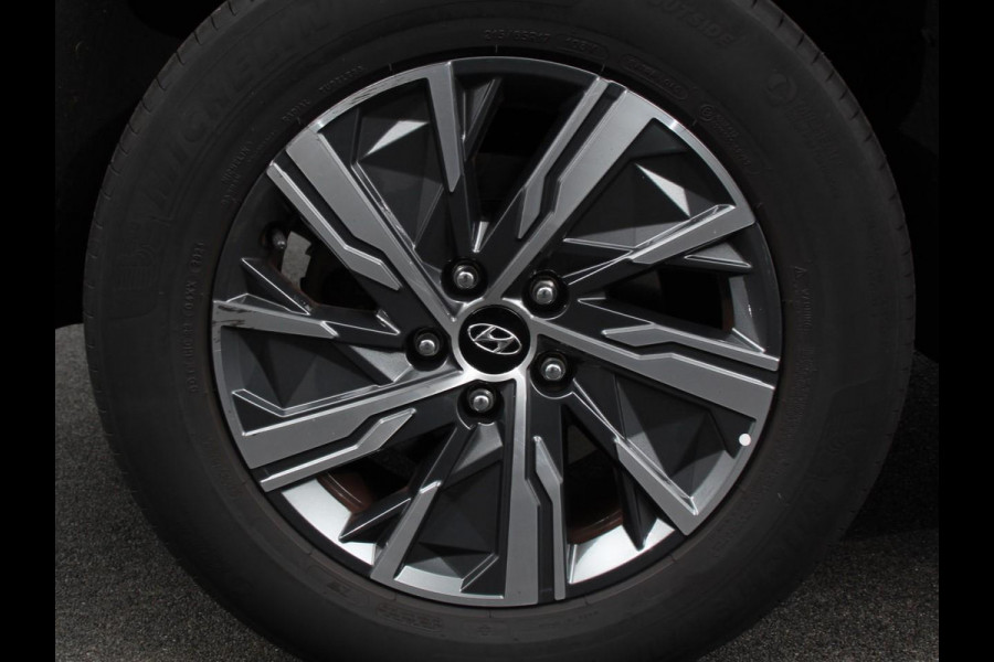 Hyundai Tucson 1.6 T-GDI HEV Comfort Climate control Adaptieve cruise control Parkeersensoren Achteruitrijcamera Navigatie Voorstoelen verwarmd Apple Carplay/ Android Auto