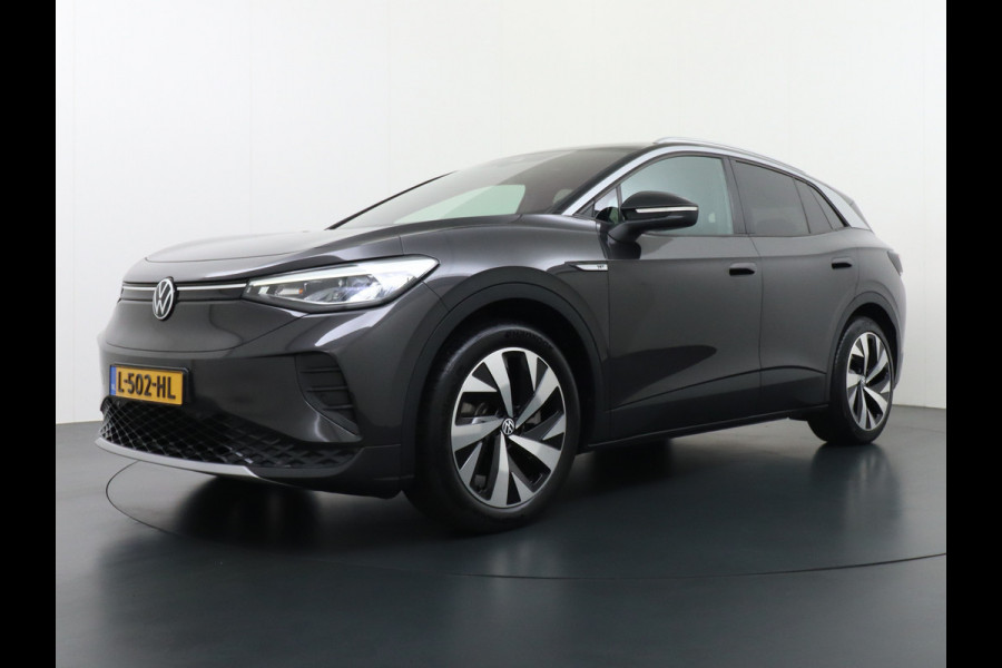 Volkswagen ID.4 1st 77kWh 204PK Trekhaak first Warmtepomp Adap.Cruise Apple Carplay/Android Auto Navi Ecc Pdc Head-Up Display DAB Keyless Matrix Stoelverwarming Rijstrooksensor Geluidsisolerend glas Connected services Draadloze telefoonlader Verkeersbord detectie Origineel Nederlandse Auto €48.913,- Nieuwprijs