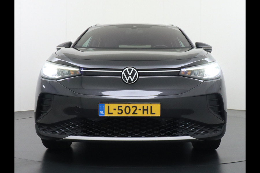 Volkswagen ID.4 1st 77kWh 204PK Trekhaak first Warmtepomp Adap.Cruise Apple Carplay/Android Auto Navi Ecc Pdc Head-Up Display DAB Keyless Matrix Stoelverwarming Rijstrooksensor Geluidsisolerend glas Connected services Draadloze telefoonlader Verkeersbord detectie Origineel Nederlandse Auto €48.913,- Nieuwprijs