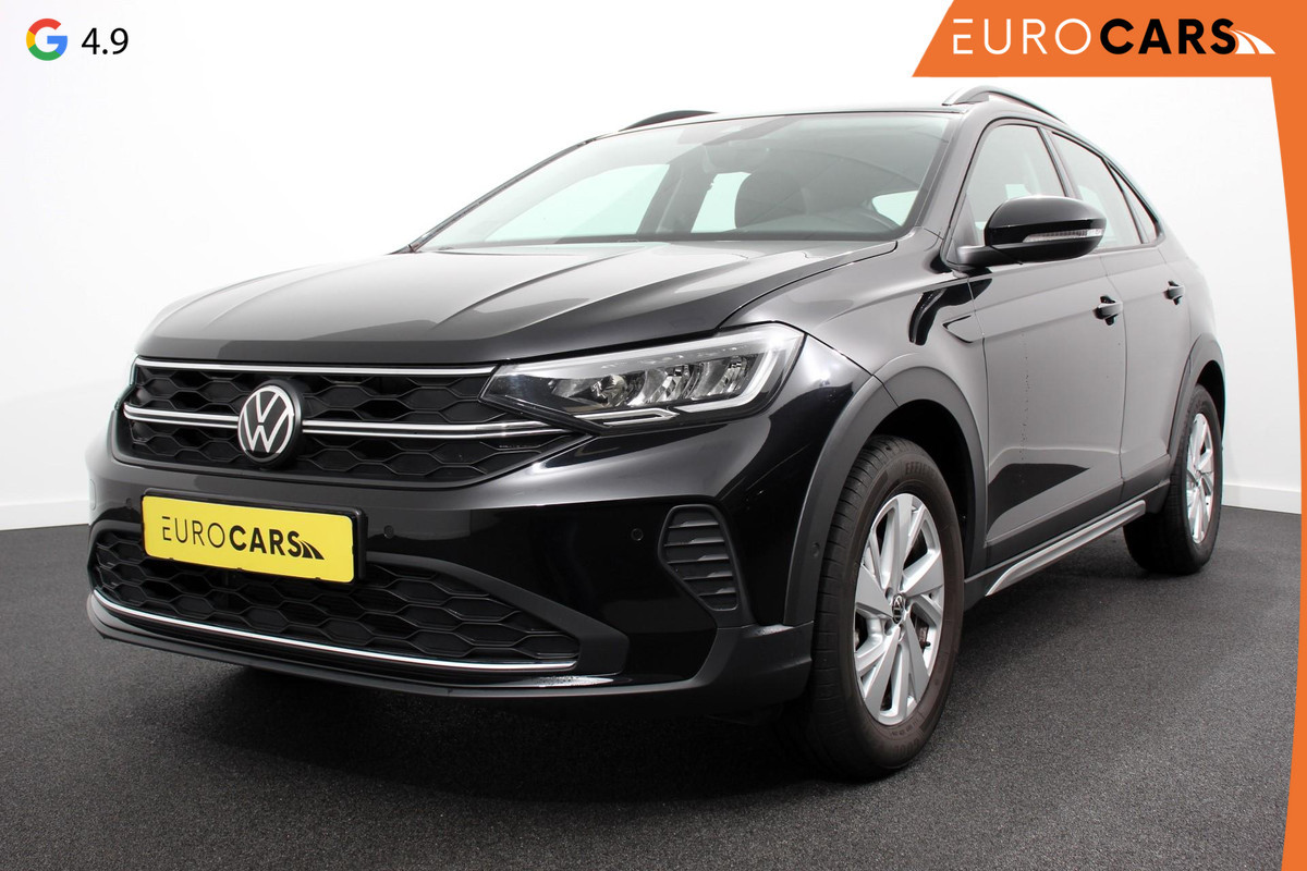 Volkswagen Taigo 1.0 TSI 110pk DSG Life | Navigatie | Apple Carplay/Android Auto Wireless | Adaptive Cruise Control | Parkeersensoren | Camera | Blind Spot Assist | Park Assist | Afneembare trekhaak | Stoelverwarming | Virtual Cockpit | Ledverlichting | Climatronic Volkswagen Taigo 1.0 TSI 110pk DSG Life | Navigatie | Apple Carplay/Android Auto Wireless | Adaptive Cruise Control | Parkeersensoren | Camera | Blind Spot Assist | Park Assist | Afneembare trekhaak | Stoelverwarming | Virtual Cockpit | Ledverlichting | Climatronic