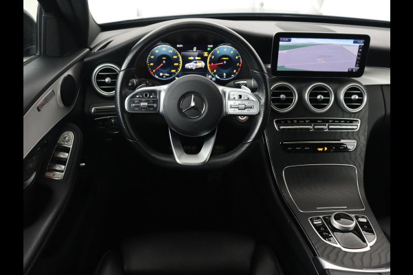Mercedes-Benz C-Klasse 180 Business Solution AMG | Leder | Trekhaak | Stoelverwarming | Camera | Night Pack | Carplay | Side Assist | Digital Cockpit | Navigatie | Full LED | Park Assist