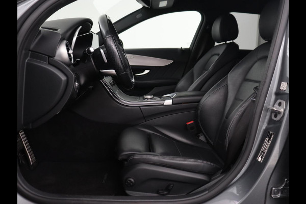 Mercedes-Benz C-Klasse 180 Business Solution AMG | Leder | Trekhaak | Stoelverwarming | Camera | Night Pack | Carplay | Side Assist | Digital Cockpit | Navigatie | Full LED | Park Assist