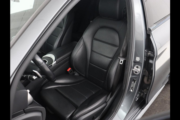 Mercedes-Benz C-Klasse 180 Business Solution AMG | Leder | Trekhaak | Stoelverwarming | Camera | Night Pack | Carplay | Side Assist | Digital Cockpit | Navigatie | Full LED | Park Assist