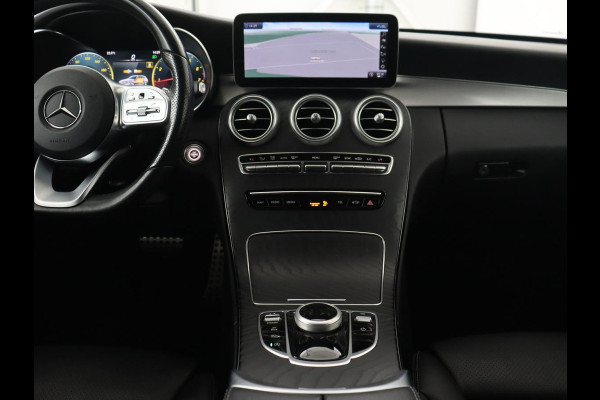 Mercedes-Benz C-Klasse 180 Business Solution AMG | Leder | Trekhaak | Stoelverwarming | Camera | Night Pack | Carplay | Side Assist | Digital Cockpit | Navigatie | Full LED | Park Assist