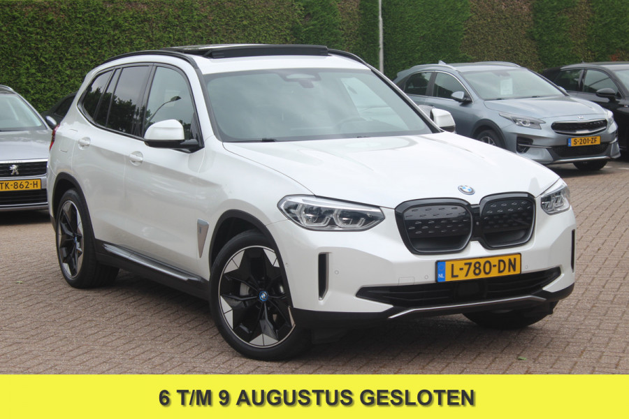 BMW iX3 High Executive 80 kWh / Trekhaak / Panoramadak / 360Camera / Head-up / 20'' / Leder / Harman Kardon / Navigatie / Memory seats / Dodehoek / DAB / Stoelverwarming / Cruise Control Adaptief