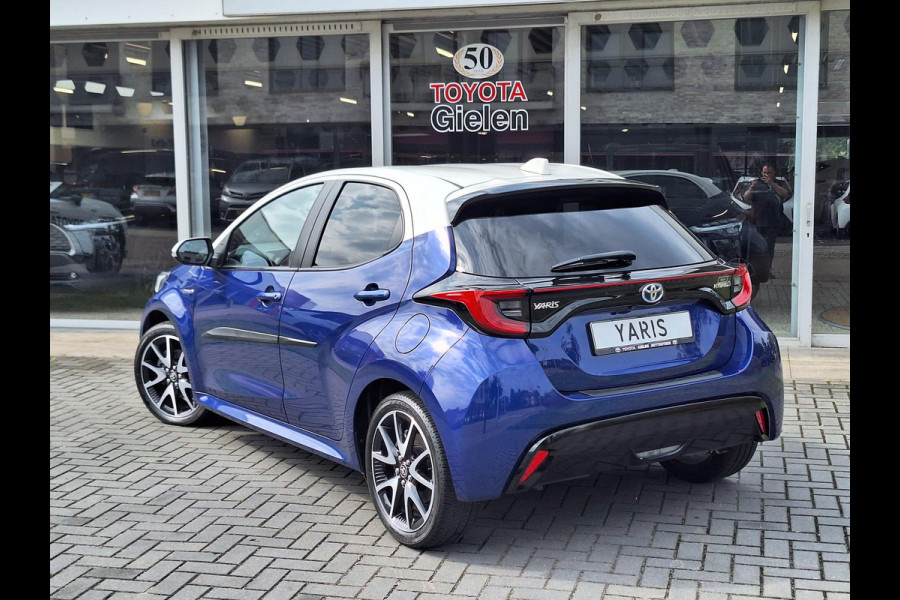 Toyota Yaris 1.5 Hybrid Style Bi-Tone | 17 inch, Stoelverwarming, Half Leer, Keyless, Privcay Glass, Apple CarPlay/Android auto