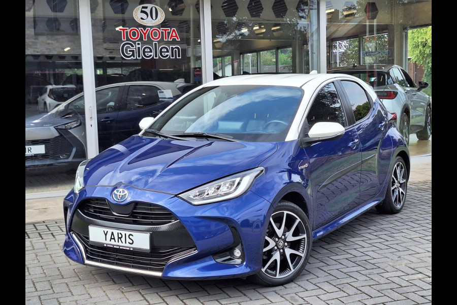 Toyota Yaris 1.5 Hybrid Style Bi-Tone | 17 inch, Stoelverwarming, Half Leer, Keyless, Privcay Glass, Apple CarPlay/Android auto