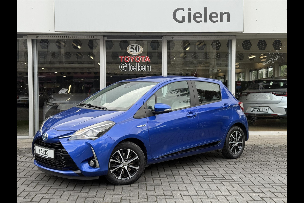 Toyota Yaris 1.5 Hybrid Dynamic | Navigatie, Stoelverwarming, Lichtmetalen velgen, Climate control, Parkeercamera, Safety Sense Toyota Yaris 1.5 Hybrid Dynamic | Navigatie, Stoelverwarming, Lichtmetalen velgen, Climate control, Parkeercamera, Safety Sense