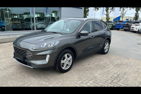 Ford Kuga 2.5 PHEV Titanium X Zuid | Weg/Uitklapbare Trekhaak (Elektrisch bedienbaar) | Adaptive cruise control | Winter Pack | Dodehoeksensoren | Bang&Olufsen | Head up Display | Half leder bekleding | 1.500 kg trekgewicht
