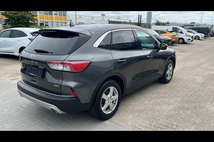 Ford Kuga 2.5 PHEV Titanium X Zuid | Weg/Uitklapbare Trekhaak (Elektrisch bedienbaar) | Adaptive cruise control | Winter Pack | Dodehoeksensoren | Bang&Olufsen | Head up Display | Half leder bekleding | 1.500 kg trekgewicht