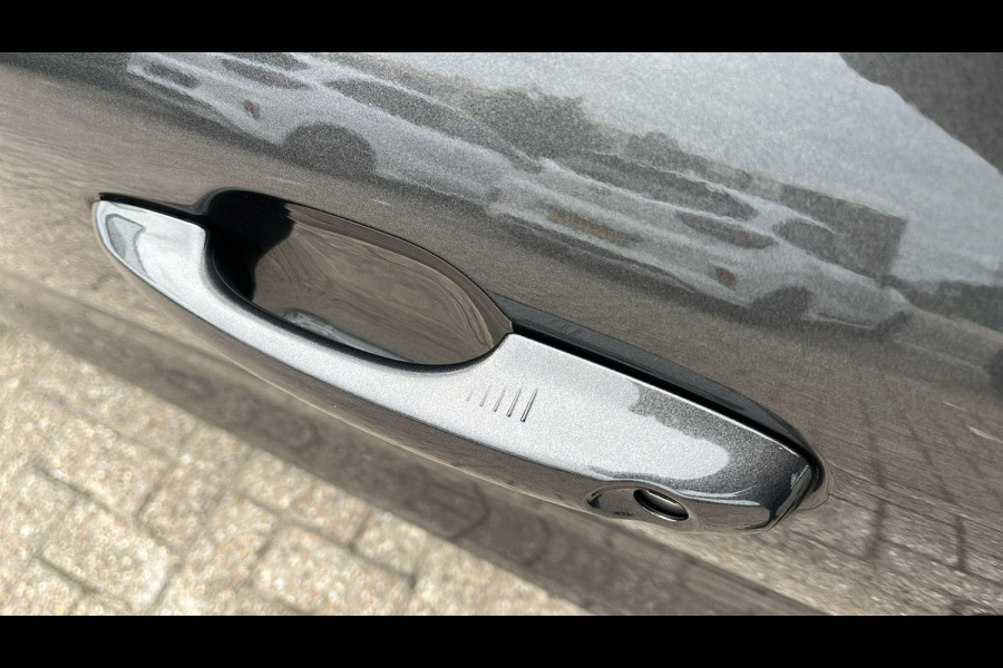 Ford Kuga 2.5 PHEV Titanium X Zuid | Weg/Uitklapbare Trekhaak (Elektrisch bedienbaar) | Adaptive cruise control | Winter Pack | Dodehoeksensoren | Bang&Olufsen | Head up Display | Half leder bekleding | 1.500 kg trekgewicht