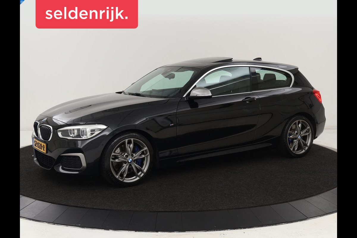 BMW 1-serie M140i High Executive | 2e eigenaar | Schuifdak | Leder | Harman/Kardon | Stoel & stuurverwarming | Camera | Carplay | Full LED | Navigatie
