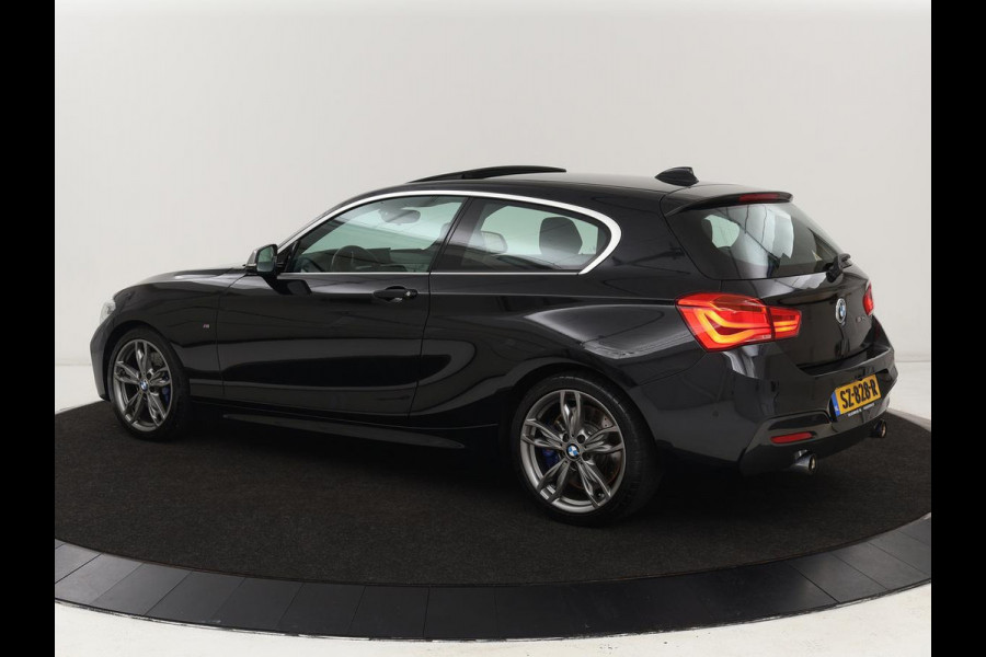 BMW 1-serie M140i High Executive | 2e eigenaar | Schuifdak | Leder | Harman/Kardon | Stoel & stuurverwarming | Camera | Carplay | Full LED | Navigatie