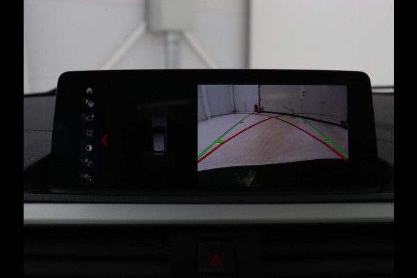 BMW 1-serie M140i High Executive | 2e eigenaar | Schuifdak | Leder | Harman/Kardon | Stoel & stuurverwarming | Camera | Carplay | Full LED | Navigatie
