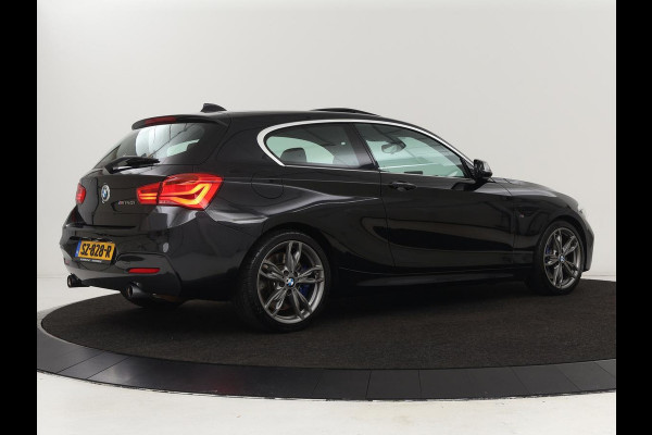 BMW 1-serie M140i High Executive | 2e eigenaar | Schuifdak | Leder | Harman/Kardon | Stoel & stuurverwarming | Camera | Carplay | Full LED | Navigatie