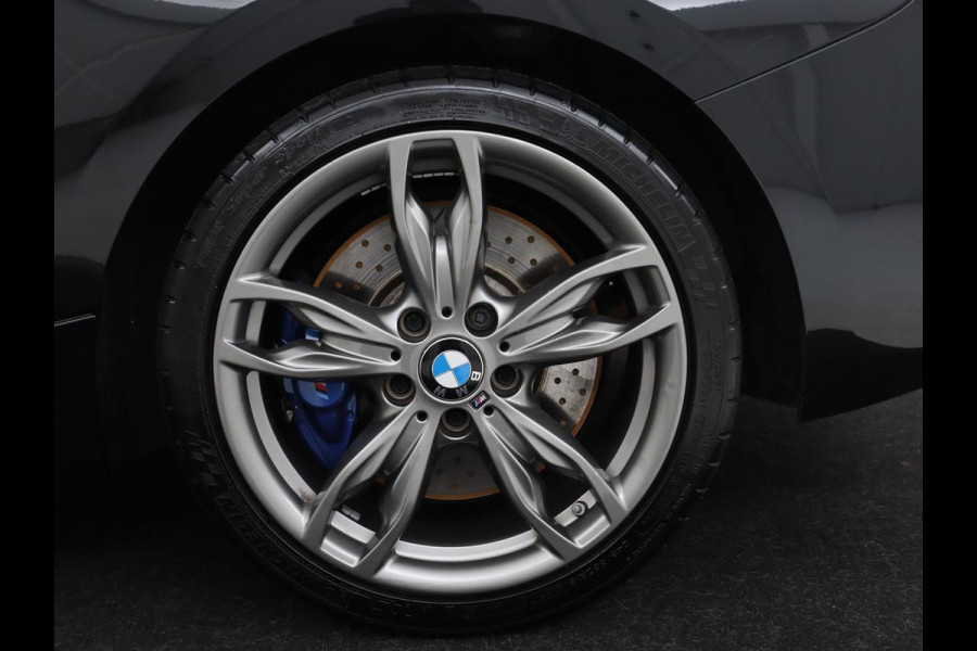 BMW 1-serie M140i High Executive | 2e eigenaar | Schuifdak | Leder | Harman/Kardon | Stoel & stuurverwarming | Camera | Carplay | Full LED | Navigatie