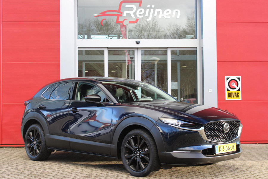 Mazda CX-30 2.0 e-SkyActiv-X MILD Hybrid 187PK HOMURA | DRAADLOOS APPLE CARPLAY/ANDROID AUTO | FULL LED KOPLAMPEN | DAB+ RADIO | CLIMATE CONTROL | STOEL VERWARMING | ADAPTIVE CRUISE CONTROL | LICHTMETALEN VELGEN BLACK | ALL SEASON BANDEN | DODEHOEK DETECTIE | ELEKTRISCHE ACHTERKLEP | STOEL VERWARMING |
