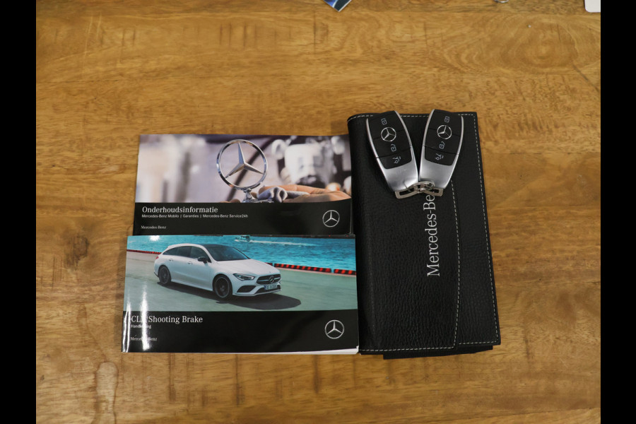 Mercedes-Benz CLA-Klasse Shooting Brake 250 e Business Solution AMG Limited [SCHUIFKANTELDAK, MEMORY SEATS, CAMERA, PDC V+A, CRUISE CONTROL, SFEERVERLICHTING, STOELVERWARMING, BLUETOOTH, NAVIGATIE, AIRCO, AMG PAKKET, NIEUWSTAAT]