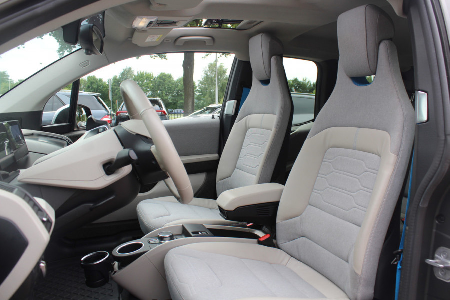 BMW i3 S iPerformance 94Ah 33 kWh / SoH 89.6% / Full option! / Panoramadak / Camera / Keyless / 20'' / Warmtepomp / Harman Kardon / Apple CarPlay / DAB / Getint glas / Stoelverwarming / ACC