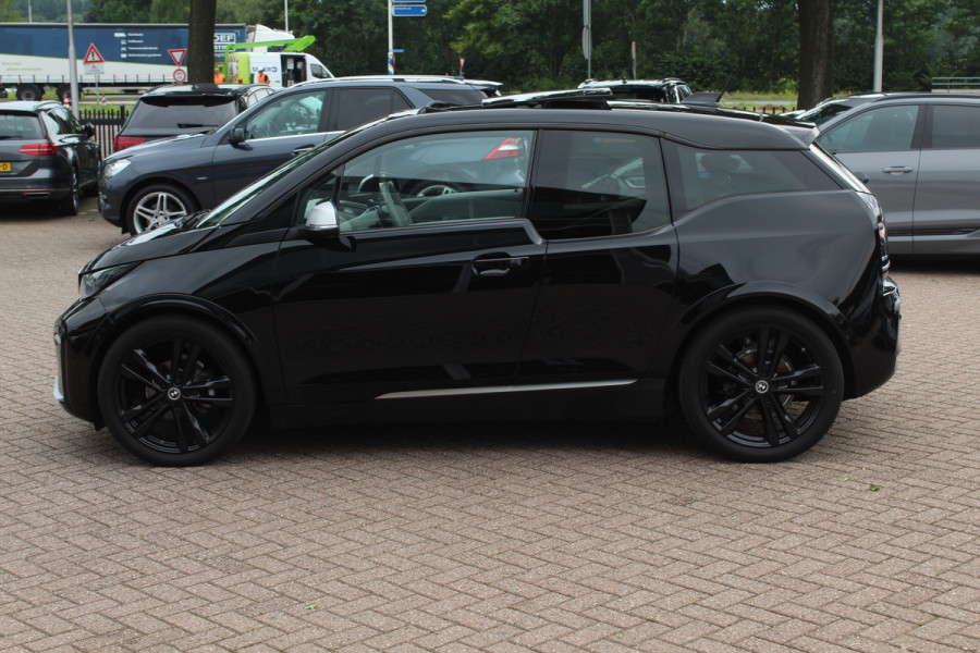 BMW i3 S iPerformance 94Ah 33 kWh / SoH 89.6% / Full option! / Panoramadak / Camera / Keyless / 20'' / Warmtepomp / Harman Kardon / Apple CarPlay / DAB / Getint glas / Stoelverwarming / ACC