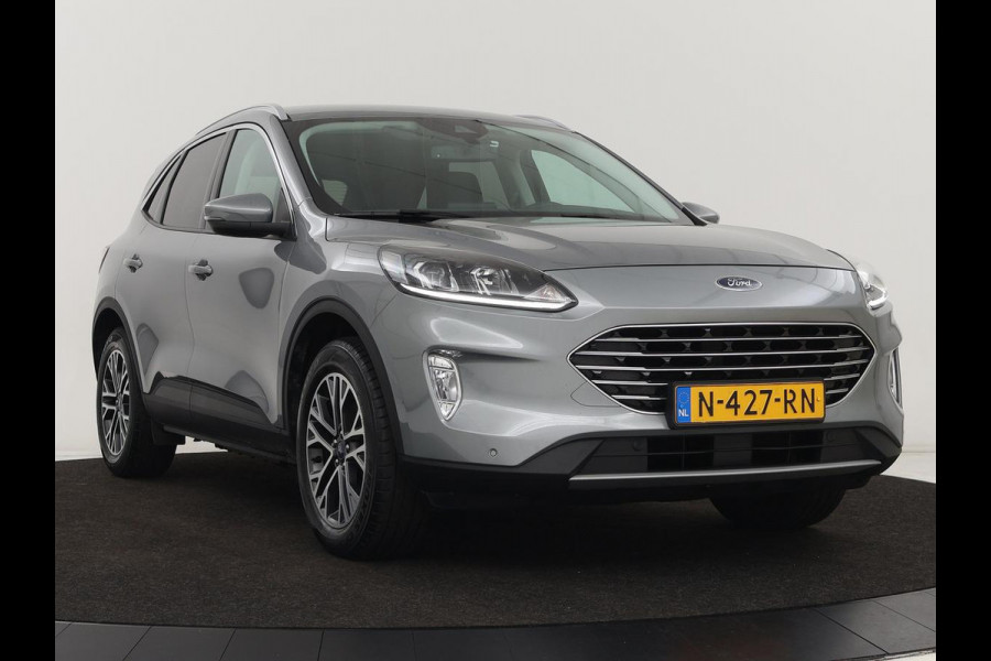 Ford Kuga 2.5 PHEV Titanium | Trekhaak | Camera | Carplay | Navigatie | Climate control | Cruise control | Bluetooth | Keyless | Digital Cockpit