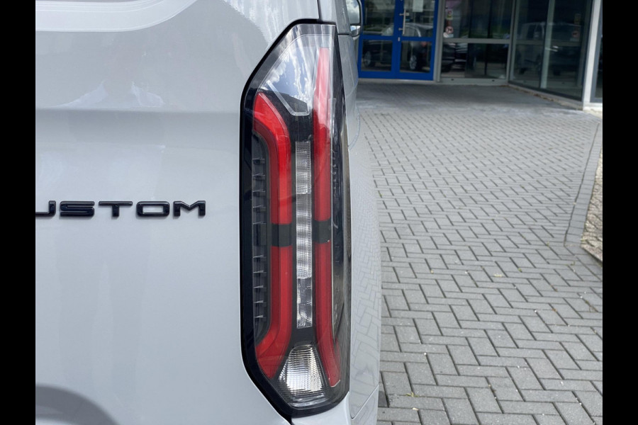 Ford Transit Custom 320 2.5 PHEV L2H1 Sport DC 233pk | | Zuid | Dubbele Cabine | Dubbele zijschuifdeur | Inklapbare trekhaak | 19 inch lichtmetalen Sport velgen (mat zwart) | Verwarmbaar stuurwiel | Navigatie systeem