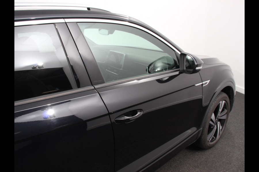 Volkswagen T-Roc 1.5 TSI 150pk DSG R-Line | Navigatie | Apple Carplay/Android Auto | Parkeersensoren | Camera | Adaptive Cruise Control | Elektrische achterklep | Stoel- en stuurverwarming | Climate Control | Ledverlichting | Virtual Cockpit