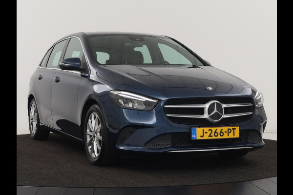 Mercedes-Benz B-Klasse 180 Advantage | Stoelverwarming | Camera | Carplay | Trekhaak | Full LED | Navigatie | Half leder | Climate control | Park Assist