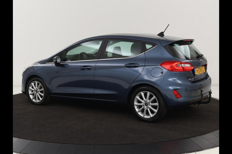 Ford Fiesta 1.0 EcoBoost Titanium | Stoel & stuurverwarming | Trekhaak | Carplay | Climate control | Cruise control | Verwarmde voorruit | Parkeerhulp