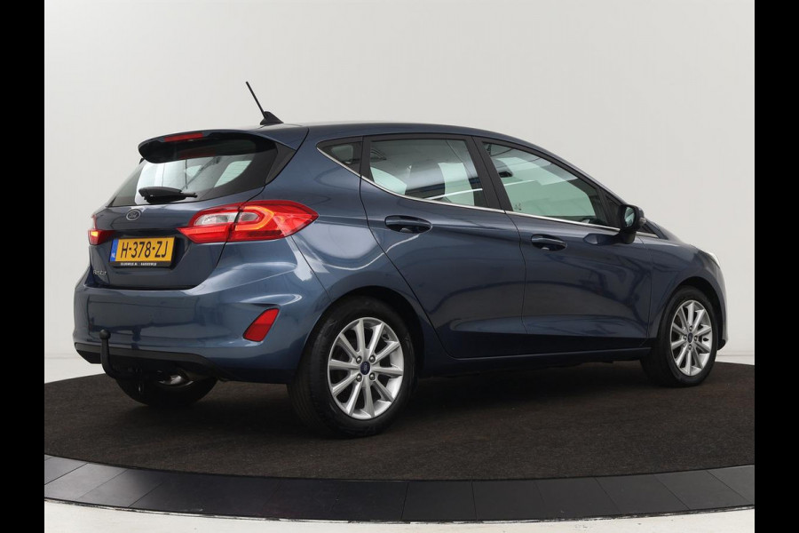 Ford Fiesta 1.0 EcoBoost Titanium | Stoel & stuurverwarming | Trekhaak | Carplay | Climate control | Cruise control | Verwarmde voorruit | Parkeerhulp