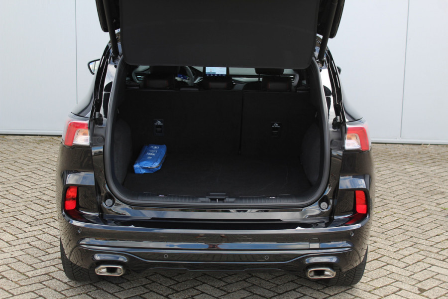 Ford Kuga 2.5-225pk Plug-in Hybrid ST-Line X. Hybride rijden voor een reële prijs ! Adaptive Cruise Control, Stoel- en voorraamverwarming, Climate Control, Metallic lak, Camera v+a, Elektr. achterklep, Side- en lane assist etc.