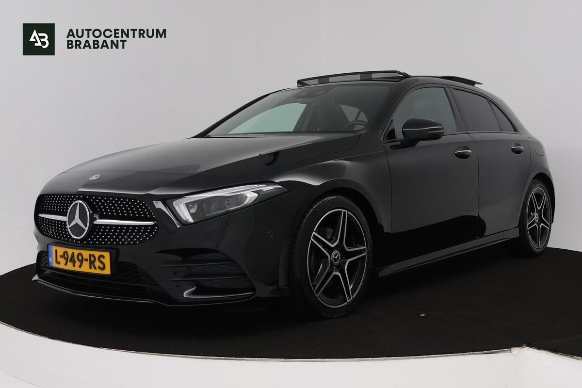 Mercedes-Benz A-Klasse 180 Business Solution AMG Automaat (SFEERVERLICHTING, PANORAMADAK, NAVI, CAMERA, NL-AUTO, GOED ONDERHOUD) Mercedes-Benz A-Klasse 180 Business Solution AMG Automaat (SFEERVERLICHTING, PANORAMADAK, NAVI, CAMERA, NL-AUTO, GOED ONDERHOUD)